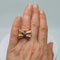 Bague 51 Bague nœud tank Art déco en or jaune 18K et rubis 58 Facettes