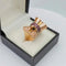Bague 51 Bague nœud tank Art déco en or jaune 18K et rubis 58 Facettes