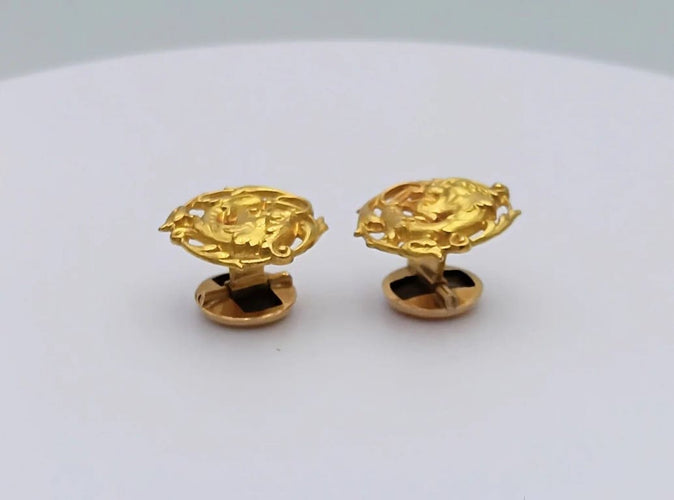 Boutons de manchette Boutons de manchette vintage chimère en or jaune 18k 58 Facettes