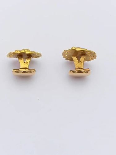 Boutons de manchette Boutons de manchette vintage chimère en or jaune 18k 58 Facettes