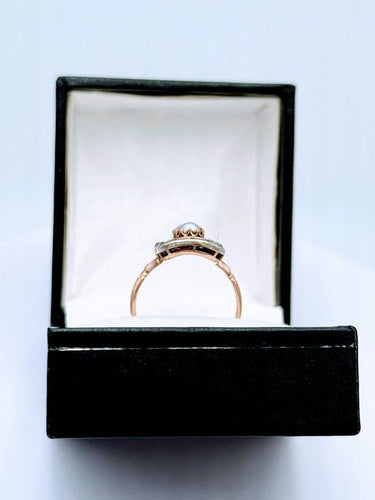 Bague 54 Bague XIXe siècle en or rose 18K sertie de rubis, perles et diamants 58 Facettes