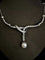 Collier Collier en or blanc 18 carats, perle de culture et diamants 58 Facettes