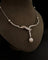 Collier Collier en or blanc 18 carats, perle de culture et diamants 58 Facettes