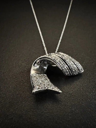 Pendentif Pendentif en or blanc et diamants taille brillant 1 ct 58 Facettes