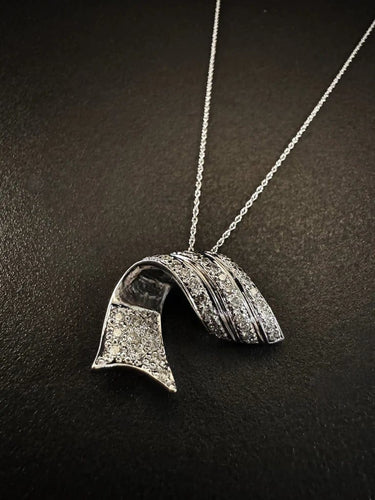 Pendentif Pendentif en or blanc et diamants taille brillant 1 ct 58 Facettes