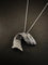 Pendentif Pendentif en or blanc et diamants taille brillant 1 ct 58 Facettes