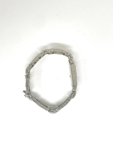Montre Montre Art déco en platine et or blanc 18k sertie de diamants 58 Facettes