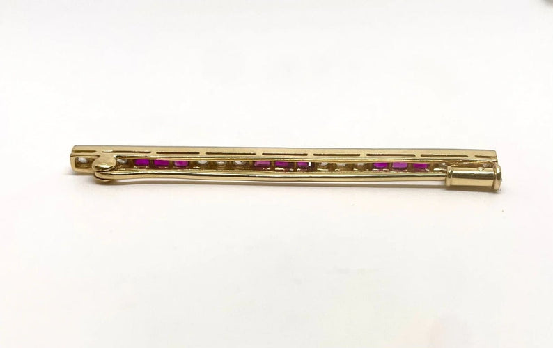 Broche Broche en or jaune et gris 18K avec rubis et diamants 58 Facettes