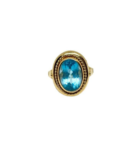 Bague 60 Bague vintage en or jaune sertie d’une topaze bleue 58 Facettes