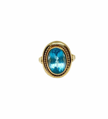 Bague 60 Bague vintage en or jaune sertie d’une topaze bleue 58 Facettes