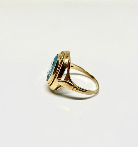 Bague 60 Bague vintage en or jaune sertie d’une topaze bleue 58 Facettes