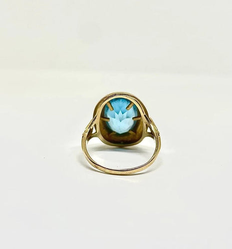 Bague 60 Bague vintage en or jaune sertie d’une topaze bleue 58 Facettes