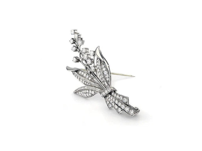 Broche Broche vintage en platine et diamants taille brillant et baguette 58 Facettes