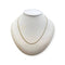 Collier Chaîne gourmette en or jaune 18K (59 cm) 58 Facettes 330086395