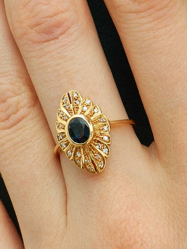 Bague 52 Bague marquise en or jaune 18 carats, saphir et diamants 58 Facettes HS20428