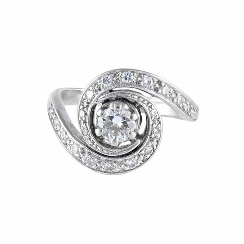 Bague 50 Bague tourbillon en or blanc 18K et diamants 58 Facettes