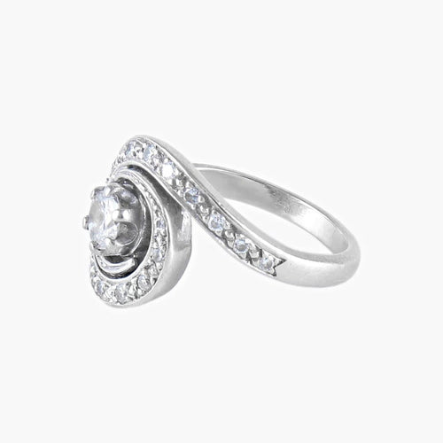Bague 50 Bague tourbillon en or blanc 18K et diamants 58 Facettes