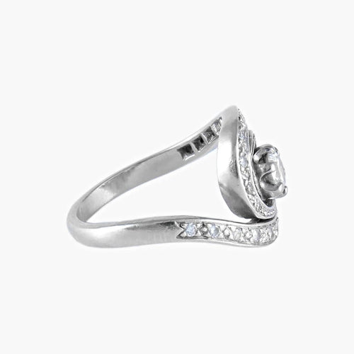 Bague 50 Bague tourbillon en or blanc 18K et diamants 58 Facettes
