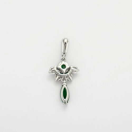 Pendentif Pendentif en or gris 18K avec diamants et émeraudes 58 Facettes HS4264