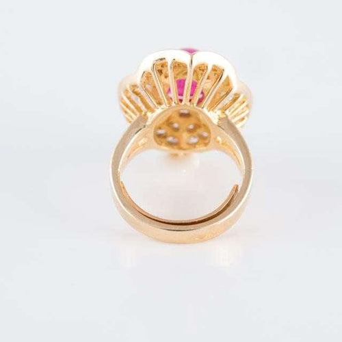 Bague 46 Bague style jupe en or jaune 18 ct, rubis cabochon et diamants 58 Facettes HS20852
