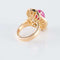 Bague 46 Bague style jupe en or jaune 18 ct, rubis cabochon et diamants 58 Facettes HS20852