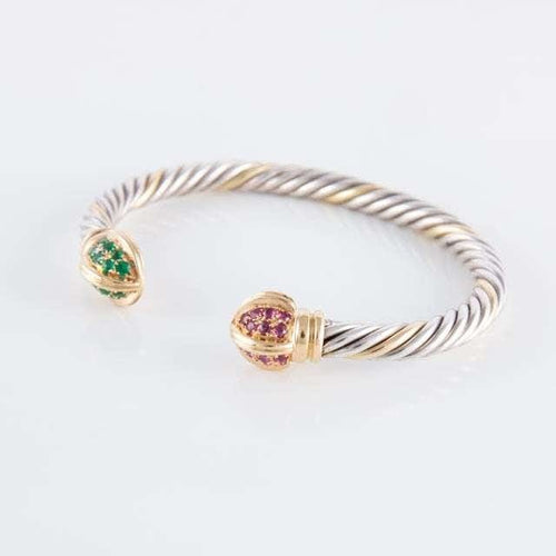 Bracelet Bracelet jonc ouvert en or jaune 18 ct, rubis et émeraudes 58 Facettes HS20836