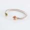 Bracelet Bracelet jonc ouvert en or jaune 18 ct, rubis et émeraudes 58 Facettes HS20836
