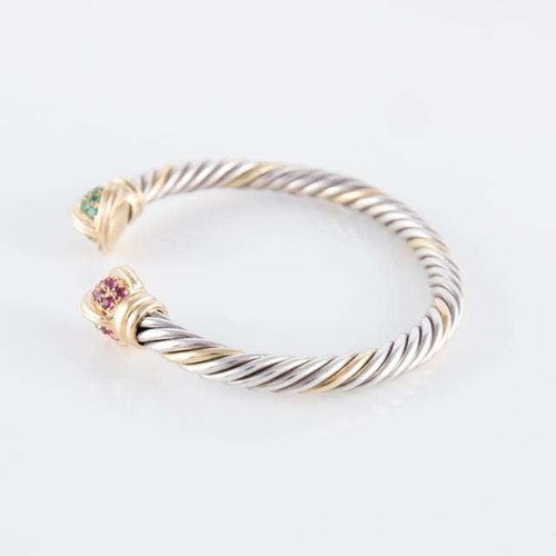 Bracelet Bracelet jonc ouvert en or jaune 18 ct, rubis et émeraudes 58 Facettes HS20836