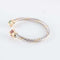 Bracelet Bracelet jonc ouvert en or jaune 18 ct, rubis et émeraudes 58 Facettes HS20836