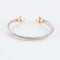 Bracelet Bracelet jonc ouvert en or jaune 18 ct, rubis et émeraudes 58 Facettes HS20836