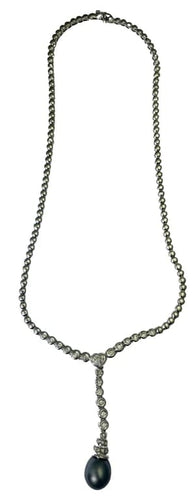 Collier Collier en or blanc 18 carats avec perle et diamants 58 Facettes