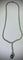 Collier Collier en or blanc 18 carats avec perle et diamants 58 Facettes
