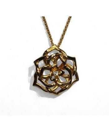 Collier Piaget - Collier chaîne avec pendentif Rose des Sables en or rose et diamant 58 Facettes F1LP19