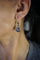 Boucles d'oreilles Boucles d'oreilles marguerite pendantes en or jaune 14 carats, saphirs et diamants 58 Facettes SQ1153870