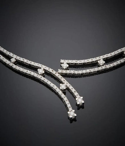 Collier Collier rivière double rang en or gris et diamants 58 Facettes LP. 258993