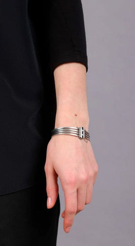 Bracelet Bracelet 4 joncs en platine avec diamants et saphirs 58 Facettes 259082