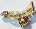 Broche Paul N Lackritz - Broche ruban rétro en or jaune, rubis et diamants 58 Facettes 248596