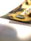 Broche Paul N Lackritz - Broche ruban rétro en or jaune, rubis et diamants 58 Facettes 248596