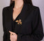 Broche Champagnat - Broche hibou en or jaune, onyx, citrines, diamants et rubis 58 Facettes 042303.03