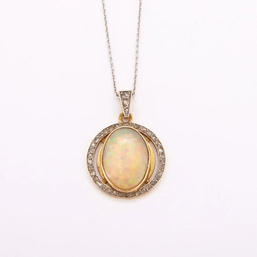 Collier Collier pendentif en or jaune et gris 18K à opale et diamants 58 Facettes