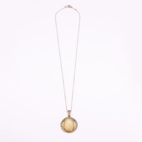 Collier Collier pendentif en or jaune et gris 18K à opale et diamants 58 Facettes