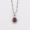 Collier Collier - Pendentif goutte rubis en or blanc et diamants 58 Facettes
