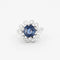 Bague 52 Bague marguerite en or gris avec saphir et diamants 58 Facettes