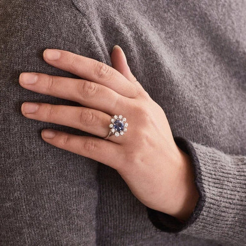 Bague 52 Bague marguerite en or gris avec saphir et diamants 58 Facettes