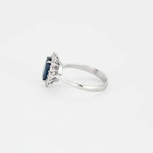 Bague 55 Bague marguerite en or gris 18 carats saphir et diamants 58 Facettes