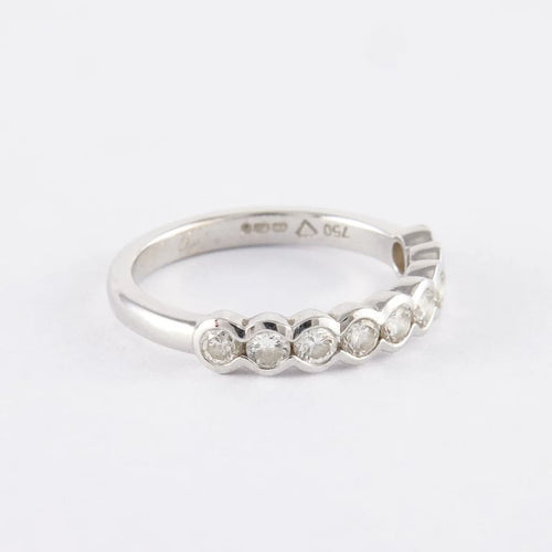 Bague 58 Demi-alliance en or gris 18k avec 7 diamants 58 Facettes