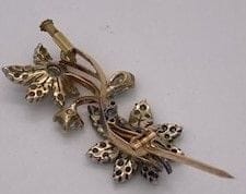 Broche Broche fleur bicolore en or et diamants 58 Facettes