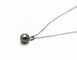 Collier Collier en or blanc 18 carats avec perle de Tahiti 58 Facettes