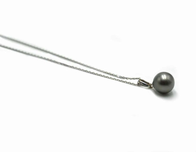 Collier Collier en or blanc 18 carats avec perle de Tahiti 58 Facettes