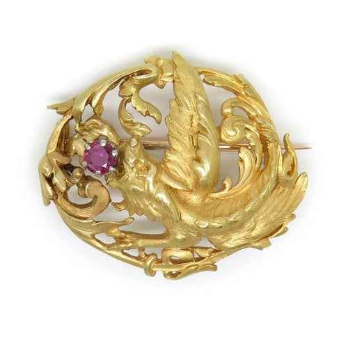 Broche Broche chimère Art nouveau en or jaune 18 carats et rubis 58 Facettes
